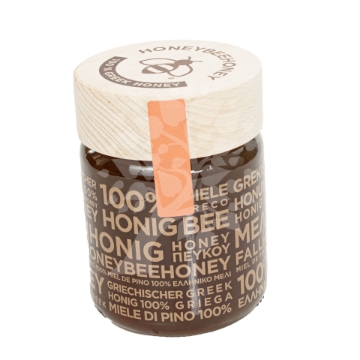 Authentic Greek Pine Honey - Rich and Earthy Flavor Premium Greek Pine Honey in a glass jar with wooden dipper