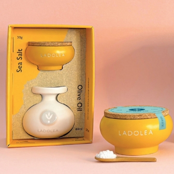 Premium Sea Salt in Handmade Ceramic Bowl. Close-up of coarse, premium sea salt in a ceramic bowl.