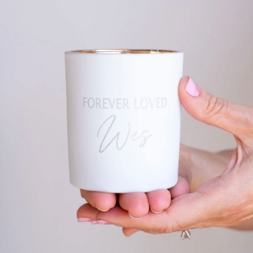 Luxurious Rose Eternelle Candle – A Thoughtful Gift An elegant display of the Forever Loved Custom Engraved Candle, showcasing its powdery rose fragrance and timeless appeal for any heartfelt celebration.